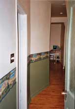 The hallway with dodgy dado wallpaper strip ... that's gotta go