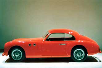 .. and a room full of brum-brums. Probably the most beautiful car ever made, the Cistalia 202 GT by Pinin Farina.